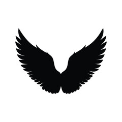 Dramatic black and white silhouette of a majestic pair of spread wings, bird wings flapping silhouette vector illustration