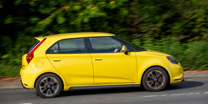Milton Keynes,Bucks,UK - Aug 31st 2025:   2014 yellow MG3 car driving on a British road