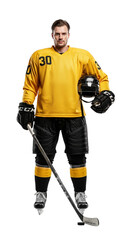Full-length studio portrait of a male ice hockey player in a yellow uniform, holding a stick and helmet, looking at the camera with a determined expression, isolated on a white background