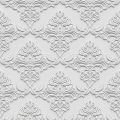 Fototapeta premium A monochrome damask pattern in shades of off-white. The ornate floral motifs appear to be embossed or raised on a clean background, creating a three-dimensional feel. Seamless repeatable texture.