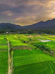 Fototapeta premium Wonderful sunrise scenery indonesia nature mountain valley forest with bright sky