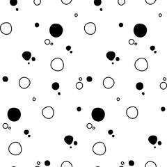 Abstract pattern of black and white circles and dots with a playful, organic feel perfect for modern design projects