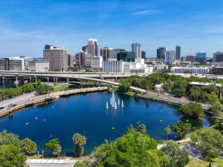 View looking over Lake Lucerne and the downtown Orlando skyline with condo and business buildings in Orange County, Orlando, Florida, USA. 