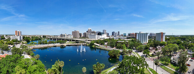 Panoramic view of downtown Orlando skyline with condo and business buildings in Orange County, Orlando, Florida, USA. 
