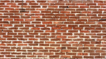 Obraz premium Old red brick wall with weathered texture
