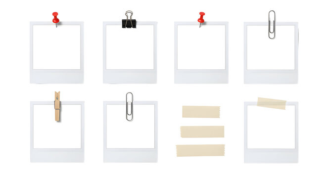 Eight blank polaroid photo frames with paper clips, thumbtacks, tape and a wooden peg, isolated on white