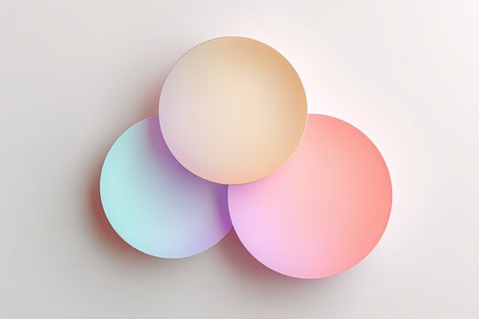 Three overlapping pastel circles on a light background.  Soft, gradient colors. Abstract, minimalist design