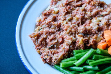 Classic Tasty Cooked Corned Beef Hash Meal With Carrots and Green Beans