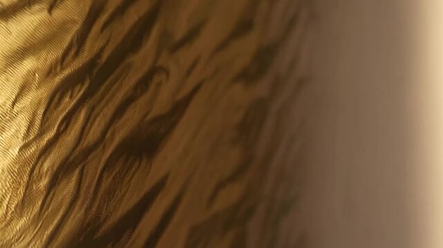 Shiny Yellow Gold Wall Texture Background for Design
