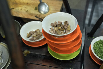 Empal Gentong is a traditional Indonesian beef soup originating from Cirebon, West Java. This savory dish is made from beef and offal cooked in a rich coconut milk broth.