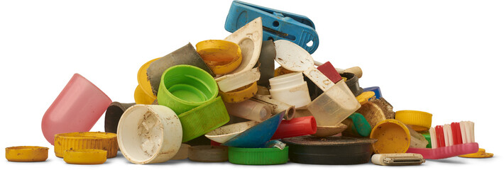 pile of dirty weathered plastic waste including bottle caps, toy parts, toothbrush, and fragments isolated white background, pollution and environmental harm concept