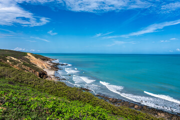 Trail along the coast and beaches from Jericoacoara to Pedra Furada in Ceara State, Brazil.