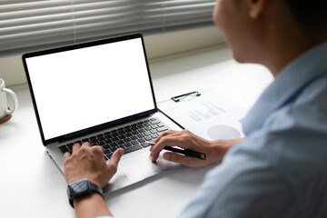 Working man using laptop with white screen mockup
