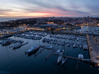 Cascais Port Marine at Night after sunset, Blue Hour, Twilights. Aerial, Illuminated City of Cascais, Lisbon, Portugal