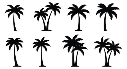 Obraz premium A collection of black palm tree silhouettes on a white background