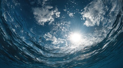 Underwater view of sunlit clouds