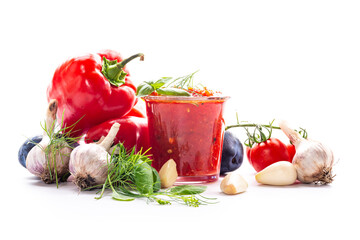 Delicious spicy tomato paste with basil and garlic cloves