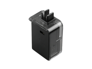 Small, black, rectangular device, encased in clear plastic