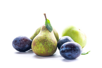Natural pear and plum fruits in studio photography