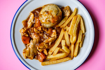 Classic Delicious Chicken Casserole With a Suet Dumpling And Gravy With Chips