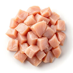 Pile of fresh raw chicken breast cubes ready for cooking white background