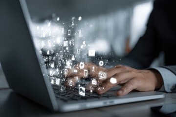 Hands typing on a laptop, digital icons appearing