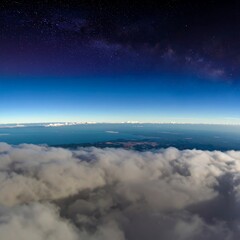 Naklejka premium Aerial view of clouds, earth, and night sky