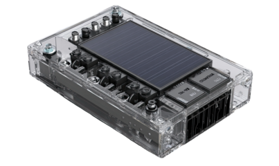 Transparent enclosure housing a solar panel, circuit board, and components.  A clear plastic box reveals internal electronic parts, including a solar panel, transistors, and connectors