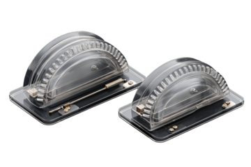 Two transparent, semi-circular devices mounted on dark gray rectangular bases.  Internal mechanisms visible