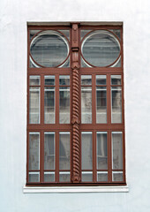 Restored original window of historic building in downtown of Krasnoyarsk city