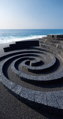 Spiral stone steps leading to ocean