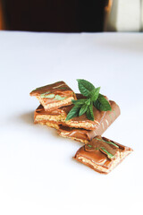 Broken Dubai chocolate with fresh mint