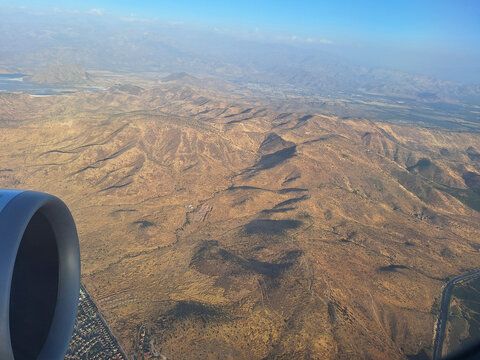 Aerial view of the desert landscape before landing at Santiago de Chile airport