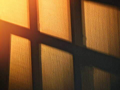 Dramatic shadows from the windows during golden sunset