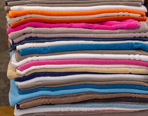 Large Stack of New Colourful Terry Towels for Bathroom