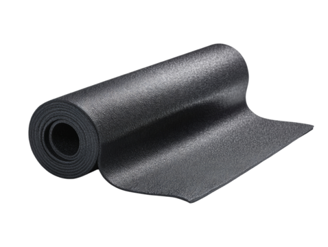Rolled out dark grey yoga mat offering comfort for meditation with space for text