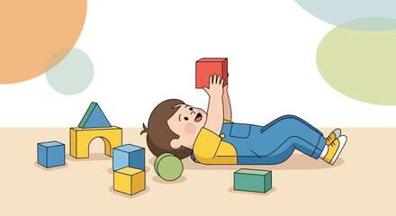 Fototapeta premium Joyful Toddler Interacting With Blocks, Lying Down on the Floor With Enthusiasm