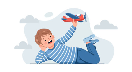 Obraz premium Joyful Boy Imagining Flight with Toy Airplane While Relaxing on Graphic Background