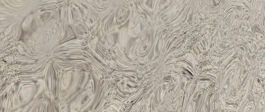 Abstract texture, reflection of stones in a distorted mirror surface