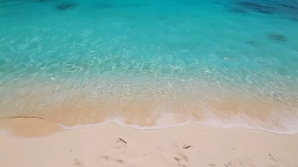 Stunning Turquoise Ocean Waves Crashing on White Sandy Beach