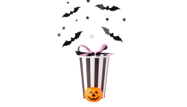 Halloween takeaway cup with bold white and black vertical stripes isolated on white background