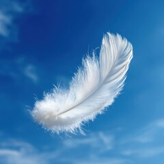 Obraz premium Light and Airy White Feather Falling Through a Bright Blue Sky