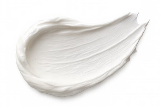 Creamy white cosmetic texture gliding smoothly across a transparent background, highlighting its soft and luxurious consistency