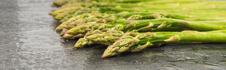 Bunch of Raw Garden Asparagus Textured Background. Fresh Green Spring Vegetables