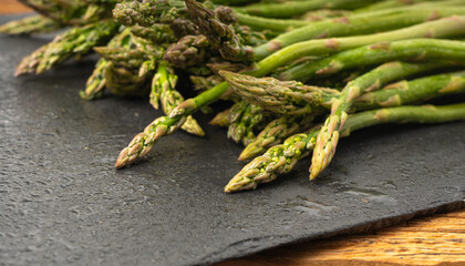 Bunch of Raw Garden Asparagus Textured Background. Fresh Green Spring Vegetables