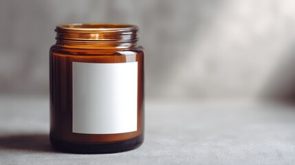 Brown candle jar with blank label mockup on gray background