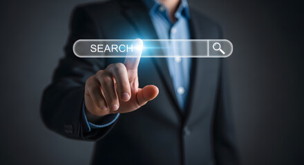 Businessman using a digital search interface.