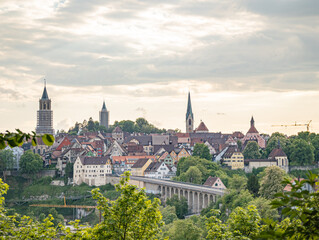 Naklejka premium A city Rottweil in Germany with a bridge and a church in the background