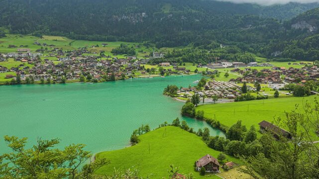 Time lapse panoramic view on a lake in the Alps. Lungernersee, Lake Lungern, Canton Obwalden, Switzerland.