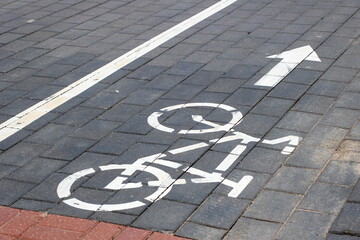 Bicycle Lane Directional Marking for Safety on Paved Roadways